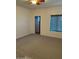 Bedroom with neutral carpeting, one window, and a ceiling fan at 9070 E Gary Rd # 152, Scottsdale, AZ 85260