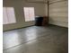 Clean, spacious two car garage features two windows and an automatic door at 9070 E Gary Rd # 152, Scottsdale, AZ 85260