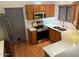 Kitchen boasts stainless steel appliances, wood cabinets and white countertops at 9070 E Gary Rd # 152, Scottsdale, AZ 85260