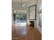 Living room showcasing hardwood floors, fireplace and sunny exterior view at 9070 E Gary Rd # 152, Scottsdale, AZ 85260