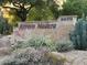 Community sign at Arroyo Madera with desert landscaping and address at 9070 E Gary Rd # 152, Scottsdale, AZ 85260