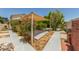 Backyard with patio area and shade for outdoor gatherings at 9133 W Virginia Ave, Phoenix, AZ 85037