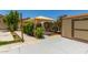 Backyard featuring a patio, shed, and shade covering at 9133 W Virginia Ave, Phoenix, AZ 85037