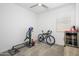 The bedroom provides ample space for exercise, complete with a wine fridge to enjoy after a workout at 9238 W Roma Ave, Phoenix, AZ 85037