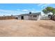 Spacious backyard with partial fence offers plenty of room to relax and play at 1051 E Millett Ave, Mesa, AZ 85204