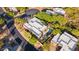 Stunning aerial view of a modern home with a private pool and lush landscaping in a desert community at 11299 E Greythorn Dr, Scottsdale, AZ 85262