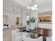 Dining room with a modern table, stylish decor, and an open layout at 11299 E Greythorn Dr, Scottsdale, AZ 85262