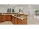 Bright kitchen features granite countertops, stainless steel appliances, and a large window with views at 11299 E Greythorn Dr, Scottsdale, AZ 85262