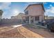 Large open backyard with covered patio and walkway, perfect for outdoor enjoyment and relaxation at 11383 W Pima St, Avondale, AZ 85323