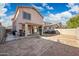 Spacious backyard featuring a covered patio, providing an ideal space for outdoor living and entertainment at 11383 W Pima St, Avondale, AZ 85323