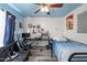 This bedroom features a sleek futon, gaming setup, and modern decor, creating a perfect blend of comfort and functionality at 11383 W Pima St, Avondale, AZ 85323