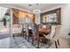 Elegant dining room featuring a wooden table and upholstered chairs at 11383 W Pima St, Avondale, AZ 85323