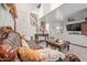 Elegant living room with a staircase, high ceilings, and stylish décor at 11383 W Pima St, Avondale, AZ 85323