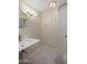 Bright bathroom featuring a walk-in shower and a sink with vanity at 1158 N Barkley St, Mesa, AZ 85203