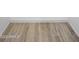 Close up of the wood-look ceramic tile flooring at 1158 N Barkley St, Mesa, AZ 85203