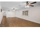 Bright living room with wood floors and doorway leading to other rooms at 1158 N Barkley St, Mesa, AZ 85203
