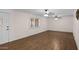 Living room featuring wood floors and neutral walls at 1158 N Barkley St, Mesa, AZ 85203