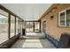 Sun room with lots of light and tiled floors that offer beautiful space for relaxation and enjoyment at 1158 N Barkley St, Mesa, AZ 85203
