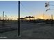 Community outdoor gathering space featuring string lights and shade structures at sunset at 1160 E Peach Tree Dr, Chandler, AZ 85249
