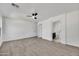 Bright bedroom has neutral paint, tile floor and ceiling fan at 1225 N 159Th Ln, Goodyear, AZ 85338