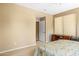 Well-lit bedroom showing neutral walls, carpet, and closet and window at 12945 W Yellow Bird Ln, Peoria, AZ 85383