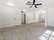 Open-concept living area featuring tile floors, neutral walls, and seamless flow to other rooms at 1510 W Fillmore St, Phoenix, AZ 85007