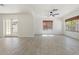 Bright, open living room featuring tile floors, neutral walls and large windows, creating an airy atmosphere at 1510 W Fillmore St, Phoenix, AZ 85007