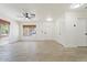 Spacious living room featuring tile flooring, neutral color palette and ample natural light at 1510 W Fillmore St, Phoenix, AZ 85007