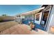 Charming back patio with a covered area and lush potted plants, ideal for outdoor enjoyment at 1710 W 13Th Ave, Apache Junction, AZ 85120
