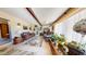 Bright living room with a large area rug, neutral walls, comfortable seating, and tasteful decor at 1710 W 13Th Ave, Apache Junction, AZ 85120