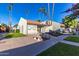 Community clubhouse with landscaping, seating, and easy sidewalk access at 222 W Brown Rd # 14, Mesa, AZ 85201