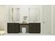 Elegant bathroom with double vanity, modern fixtures, and ample counter space at 25576 N 174Th Dr, Surprise, AZ 85387