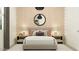 Well-decorated bedroom with stylish wallpaper, a round mirror, and comfortable furnishings at 25576 N 174Th Dr, Surprise, AZ 85387
