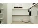 Well-organized walk-in closet with shelving and hanging space for efficient storage at 25576 N 174Th Dr, Surprise, AZ 85387