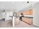 Bright kitchen featuring stainless steel appliances, tile floors, and plentiful cabinet space at 2605 W Darrel Rd, Phoenix, AZ 85041