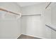 Walk-in closet featuring installed shelving and racks, providing ample space for organization and storage at 2605 W Darrel Rd, Phoenix, AZ 85041