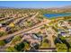 Beautiful home in a lakeside community, featuring mature landscaping and sports court with easy access to the water at 2661 E Birchwood Pl, Chandler, AZ 85249