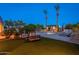 Expansive backyard featuring a pool, spa, pergola, and lush landscaping at 2661 E Birchwood Pl, Chandler, AZ 85249