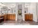 Large bathroom featuring dual sink vanity with wood cabinets at 2661 E Birchwood Pl, Chandler, AZ 85249