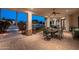 Spacious covered patio with brick pavers, ceiling fans, and outdoor dining at 2661 E Birchwood Pl, Chandler, AZ 85249