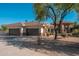 Exterior showcasing a well-maintained property with a spacious three car garage at 2661 E Birchwood Pl, Chandler, AZ 85249