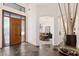 Elegant foyer with high ceilings and wood door at 2661 E Birchwood Pl, Chandler, AZ 85249