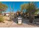 Inviting home exterior featuring desert landscaping and a stone-accented entrance at 2661 E Birchwood Pl, Chandler, AZ 85249