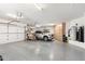 Spacious three car garage with built-in cabinets and storage at 2661 E Birchwood Pl, Chandler, AZ 85249