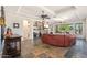 Spacious living room features a stone fireplace and abundant natural light at 2661 E Birchwood Pl, Chandler, AZ 85249