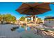 Inviting pool with lounge chairs and a shaded pergola, perfect for relaxing outdoors at 2661 E Birchwood Pl, Chandler, AZ 85249