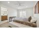 Bright bedroom featuring modern decor, a ceiling fan, and ensuite bathroom at 2949 N 29Th St, Phoenix, AZ 85016