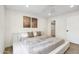 Bright bedroom featuring modern decor, a ceiling fan, and ensuite closet space at 2949 N 29Th St, Phoenix, AZ 85016