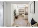 Bright entryway with wood floors flows into the living area, highlighted by an elegant light fixture at 2949 N 29Th St, Phoenix, AZ 85016