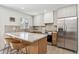 Bright kitchen featuring stainless steel appliances, a marble countertop, and modern lighting at 2949 N 29Th St, Phoenix, AZ 85016
